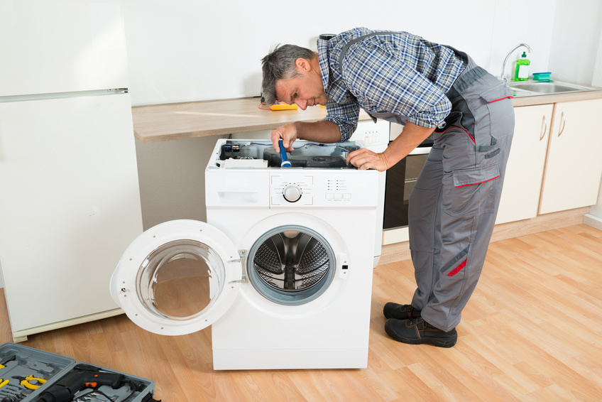 Technician-Repairing-Washing-Machine.jpg